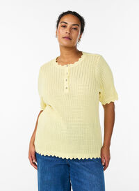 Short-sleeved knit blouse with openwork pattern and wavy edges, Yellow, Model