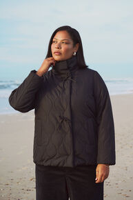 Short quilted jacket with bows, , Model